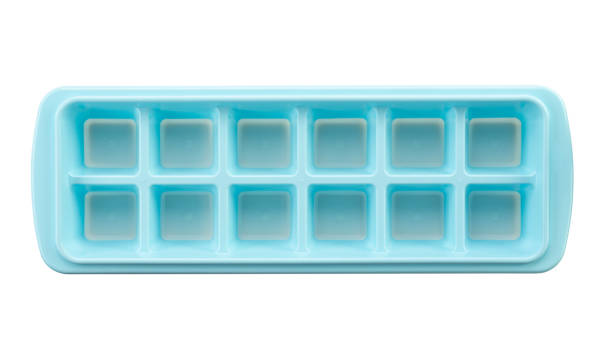 istock Top view of blue plastic ice cube tray isolated on white. 1327960515