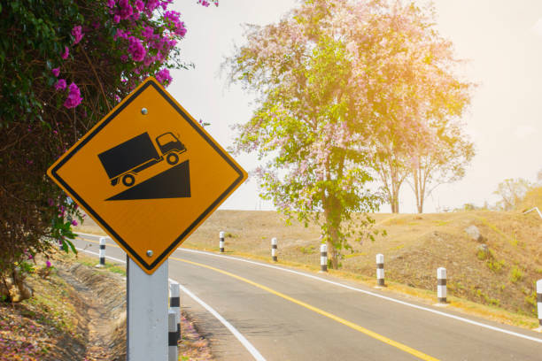 istock Traffic warning signs, the car is going up a steep slope. 1327961102