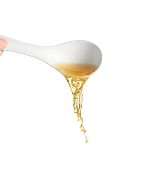 chef pouring noodle soup isolated on white background, Soup for sukiyaki from chicken and fish