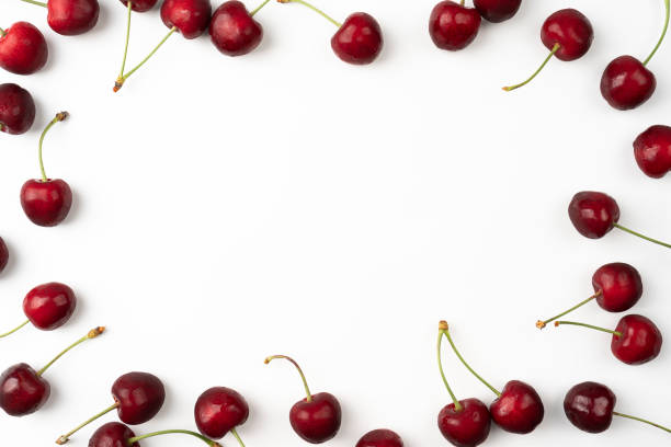 istock Ripe cherry on a white background Cherries with copy space for text Top view 1327963045