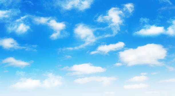 istock Sunny day background, blue sky with white cumulus clouds 1327966738