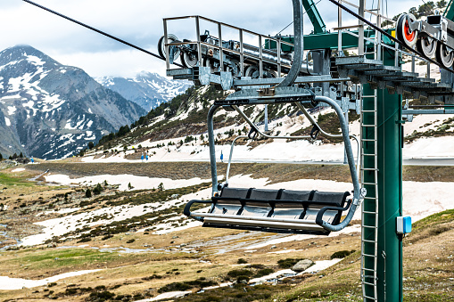 Ski lift chair in Pyrenees mountains, Andorra.