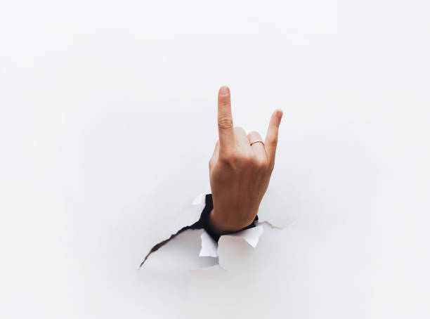 istock Hand making rock sign on white background. Copy space. Poster. sign language. 1327970341