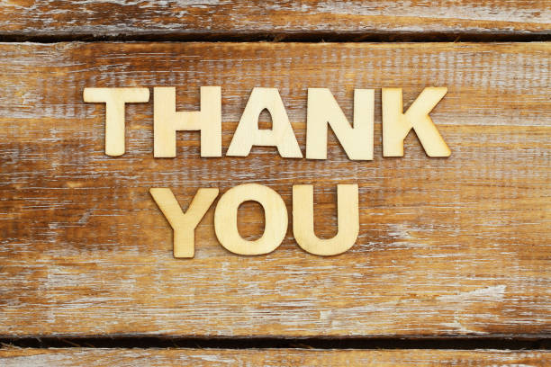 istock Thank you written with wooden letters on rustic surface 1327974287