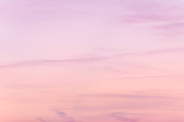 istock sunset background. sky with soft and blur pastel colored clouds.  gradient cloud on the beach resort. nature. sunrise.  peaceful morning. 1327975889