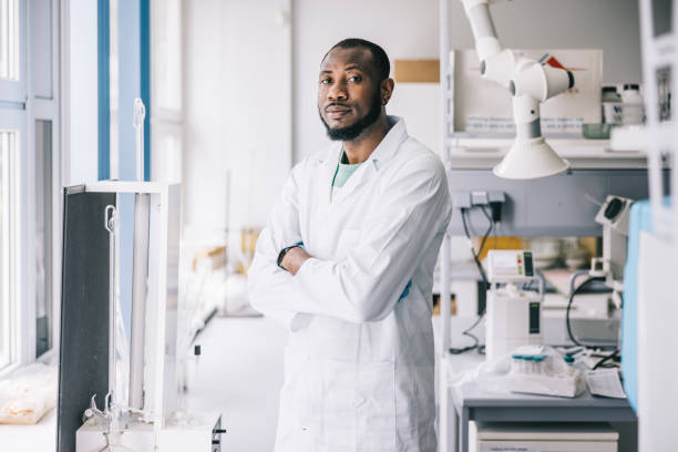 istock Portrait of confident black scientist 1327977777