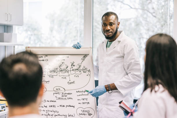 istock Scientist making a presentation to colleagues 1327977835
