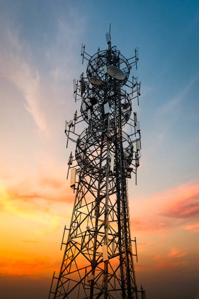 istock 5G Sunset Cell Tower: Cellular communications tower for mobile phone and video data transmission 1327982062