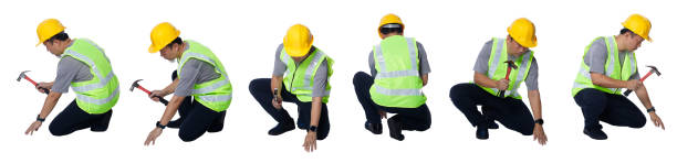 istock Asian Elderly man Engineer labor hit nail with Hammer isolated 1327983402