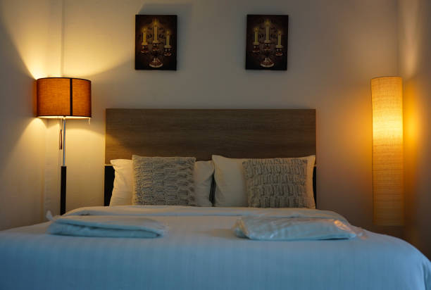 Bed room hotel and warm light lanterns vintage style