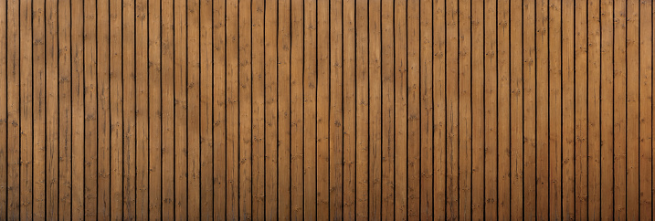 High angle view of a flat textured wooden board backgrounds. It has a beautiful nature and abstractive pattern. A close-up studio shooting shows details and lots of wood grain on the wood table. The piece of wood at the surface of the table also appears rich wooden material on it. The wood is dark brown color with darker brown lines and pattern on the bottom. Flat lay style. Its high-resolution textured quality.