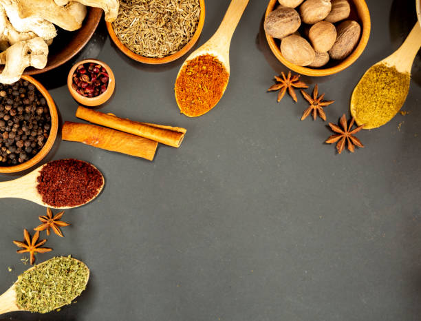 istock Spices and Herbs on Black Background. 1327991795