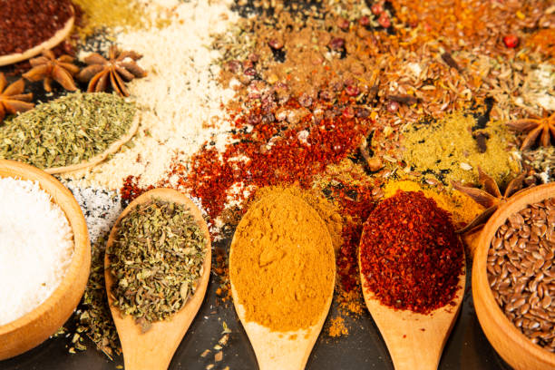istock Spices and Herbs on Black Background. 1327991875