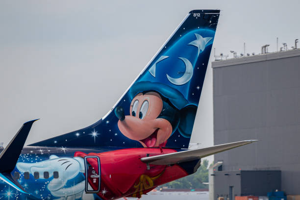 Westjet's Walt Disney World livery Montreal, Quebec, Canada - 07 07 2021: Westjet's Walt Disney World livery on their 737-8CT landing in Montreal. Registration C-GWSZ disney world stock pictures, royalty-free photos & images