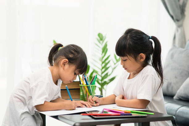 istock Covid-19 Coronavirus and Learning from home, Home school kid concept. Little children study online learning from home with laptop. 1327995867
