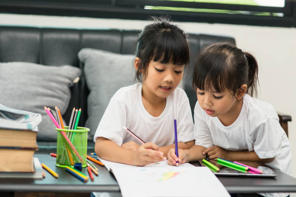 istock Covid-19 Coronavirus and Learning from home, Home school kid concept. Little children study online learning from home with laptop. 1327995886