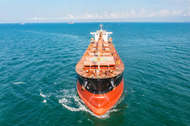 istock Aerial view of cargo ship in transit. 1327996230
