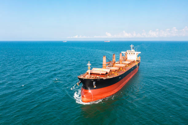 istock Aerial view of cargo ship in transit. 1327996848