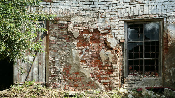 The dilapidated walls of the Bobruisk fortress made of red brick. High quality photo