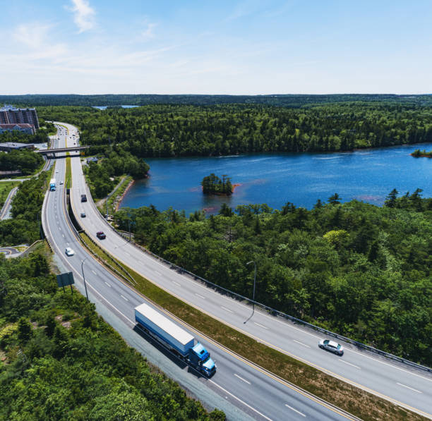 istock Semi Truck on Curving Highway 1328004519