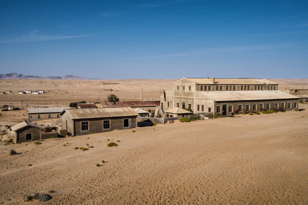 Abandoned Buildings in Kolmanskop, a Ghost Town Near Luderitz in the Namib Desert, Namibia Abandoned buildings in the old mining town of Kolmanskop near Luderitz, Namib Desert, Namibia. kolmanskop namibia stock pictures, royalty-free photos & images