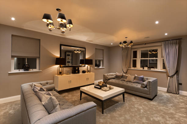 istock lounge / reception room of a luxury home evening view 1328010052