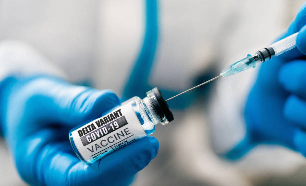 vaccine that protects against the variants vaccine that protects against the variants b117 covid 19 variant stock pictures, royalty-free photos & images