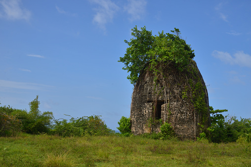 The remains of an old windmill tower constructed using slave labor in the early 1600s by the Spanish settlers in Jamaica.  The structure is located  on the Green Castle Estate Eco-Lodge