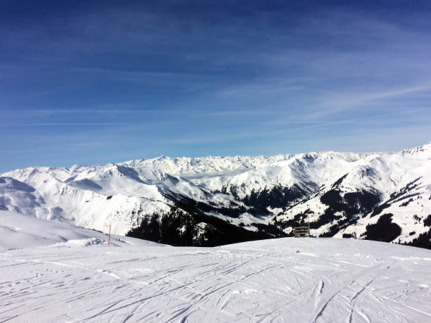 istock Winter snow covered mountain peaks in Austrian alps. 1328016043