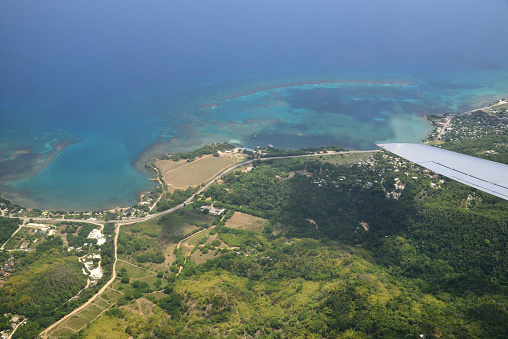 An aerial view flying over Montego Bay, Jamaica in a landing pattern.