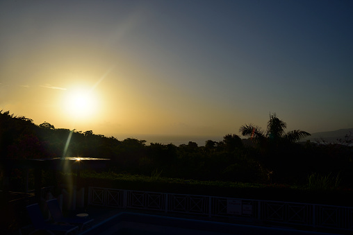 Sunrise over Annotto Bay with the Blue Mountains in the far background as seen from the Green Castle Estate Eco Lodge in Jamaica