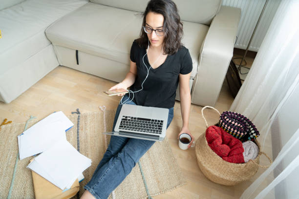 istock Young woman working at home 1328023340