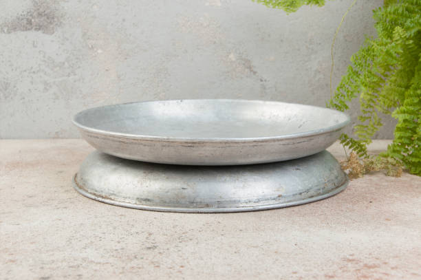 istock Old metal plates for scales on concrete background. 1328032543