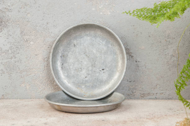 istock Old metal plates for scales on concrete background. 1328032556