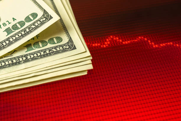 istock US dollars devaluation crisis concept with red stock chart background, copy space photo 1328033854