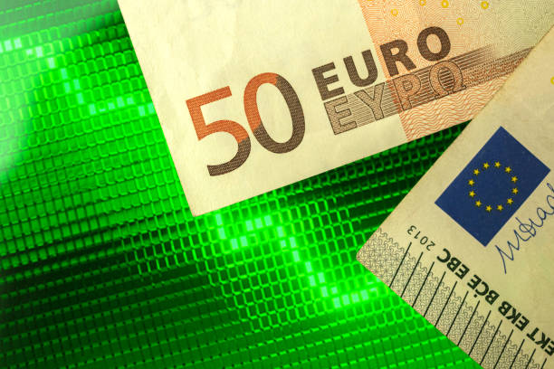 europe union money on green stock chart background, business and financial concept of currency growth - currency exchange currency european union currency dollar imagens e fotografias de stock