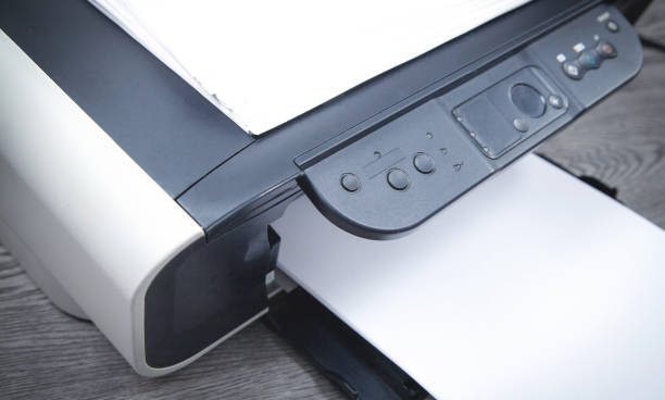 istock Xerox printer machine and papers on the desk. 1328034554