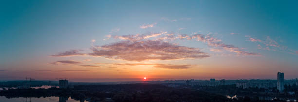 istock Aerial scenic sunrise sky panorama with clouds 1328040671