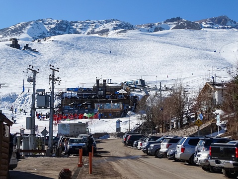Street with cars parked near the La Parva ski resort in Farellones Chile