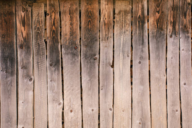 istock Wall, fence from old rural wooden boards, background and texture. 1328045525