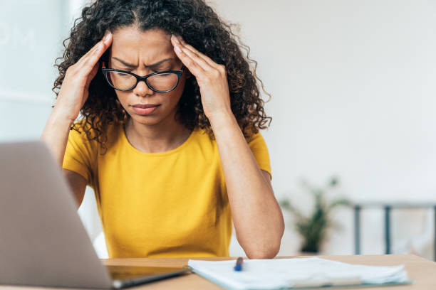 istock Business woman with headache 1328050392