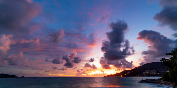 istock Long exposure colorful sunset or sunrise over sea Clear sky sunset with reflection light on sea surface Idyllic amazing landscape Climate change Beauty in nature environment. 1328060564