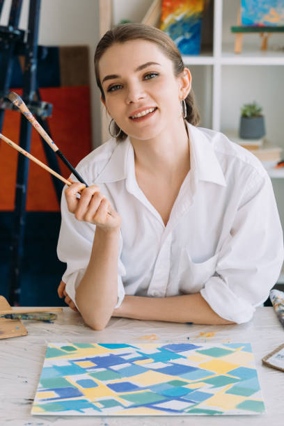 istock painting course modern art smiling female painter 1328061652