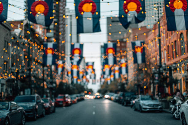 Defocused Wide Angle Background Shot of Colorado Flags and String Lights on Larimer Square in Denver, Colorado at Dusk Defocused Wide Angle Background Shot of Colorado Flags and String Lights on Larimer Square in Denver, Colorado at Dusk denver photos stock pictures, royalty-free photos & images