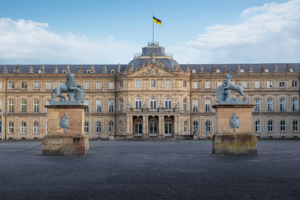 Werneck, Germany - May 02, 2025: Entrance to the castle in Werneck near Schweinfurt in Lower Franconia. Werneck Castle is a former residence of the Prince-Bishops of Würzburg in the Bavarian market town of Werneck. The baroque three-winged complex was built between 1731 and 1747 on the orders of Friedrich Karl von Schönborn, based on a design by Balthasar Neumann. Today the psychiatric clinic, the forensic clinic, the orthopedic clinic and the geriatric psychiatric clinic are housed here.