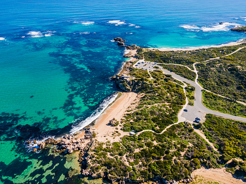 Aerial view of Point Peron and Shoalwater Bay with rocky limestone formations and seagrass.