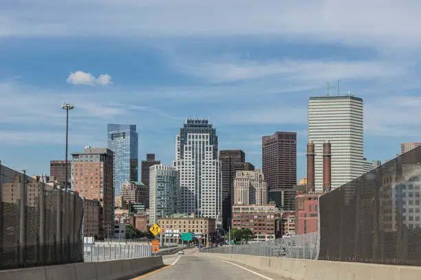 entering Boston by interstate with blue sky and skyline, USA