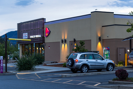 Roseburg, Oregon, USA - June 10th, 2021: Taco Bell Drive-through at dusk