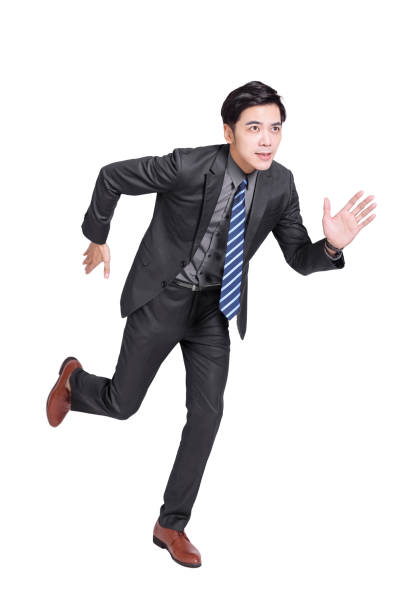 istock Young handsome businessman staring ahead and running.Isolated on white background. 1328090164