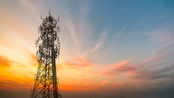 Photo of 5G Sunset Cell Tower: Cellular communications tower for mobile phone and video data transmission